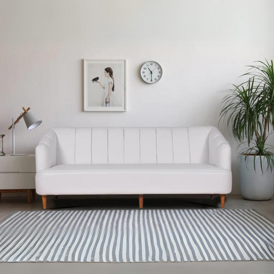 Nelio Three Seater Sofa in Cream Color Leatherette