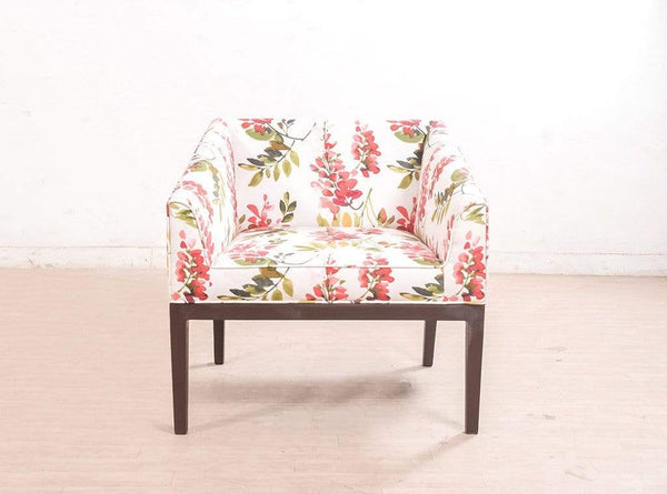 Orita Arm Chair In Coral By Urban Ladder