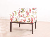 Orita Arm Chair In Coral By Urban Ladder
