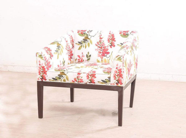 Orita Arm Chair In Coral By Urban Ladder