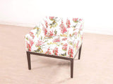 Orita Arm Chair In Coral By Urban Ladder