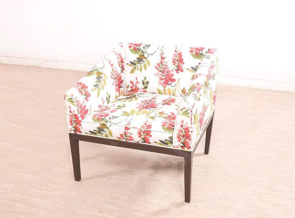 Orita Arm Chair In Coral By Urban Ladder