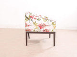Orita Arm Chair In Coral By Urban Ladder